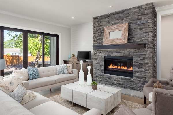 Here are a couple of ideas to give your fireplace a facelift on a budget.